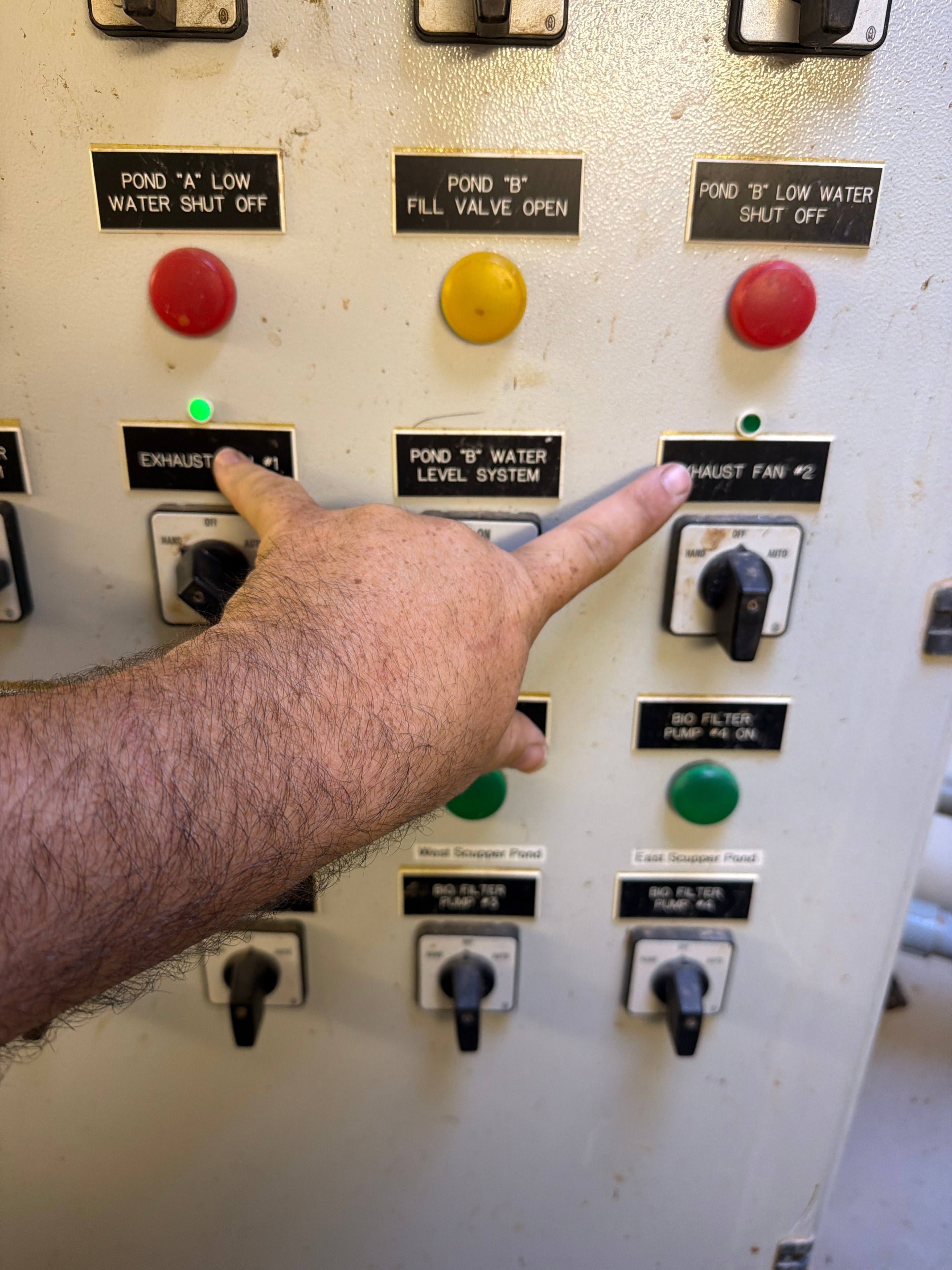 Pond control panel with labeled switches and indicators