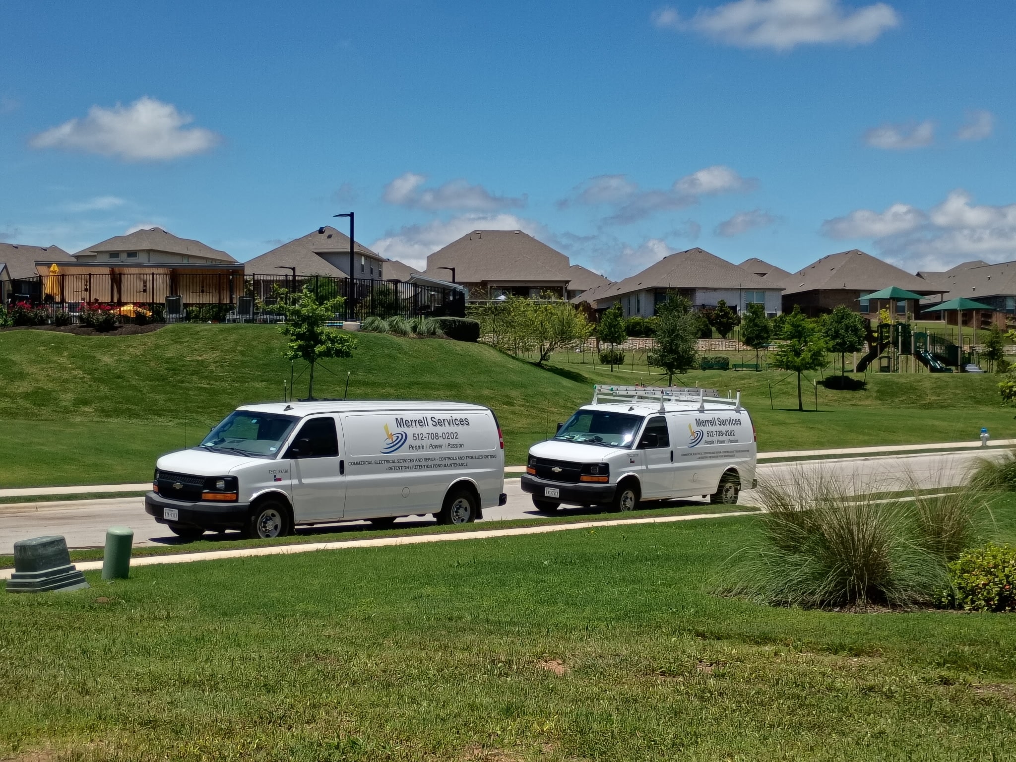 Merrell Services fleet vehicles on a commercial job site